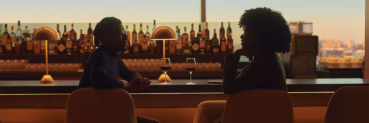 Couple drinking in Chelsea Lounge, JFK.