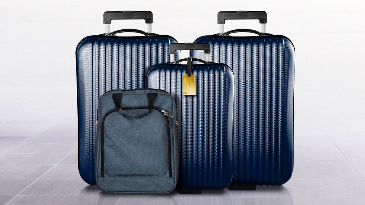 Three suitcases with Executive Club Gold bag tag and a carry case.