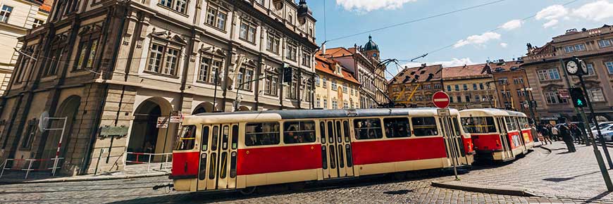 Classic red tram on the streets of Lesser town (Mala Strana) in Prague, Czech Republic.