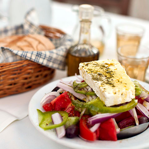 Greek salad with country bread and home made white wine.