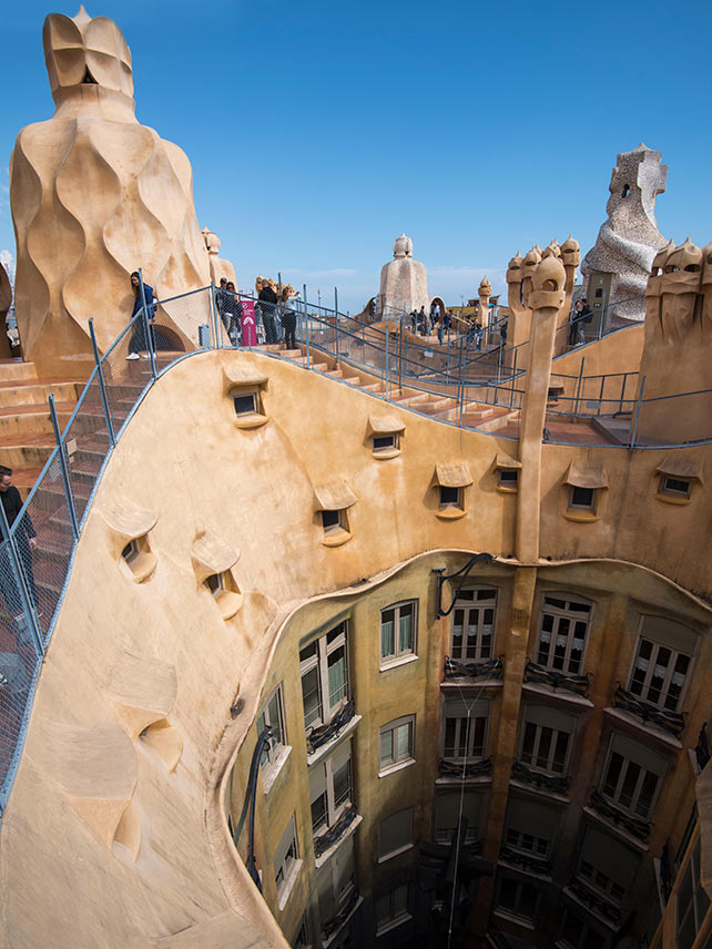 Looking down into the courtyard from the Roof of Casa Mila. © Tracey Whitefoot / Alamy Stock Photo.