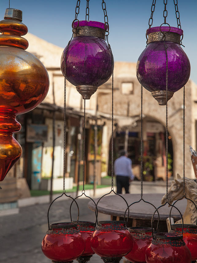 Through rose-tinted lenses in Souk Waqif. Photo by Jane Sweeney / Getty Images