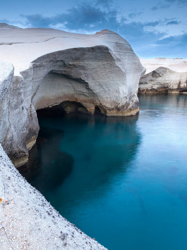 Explore the caves of Milos © Evgeni Dinev Photography/Getty