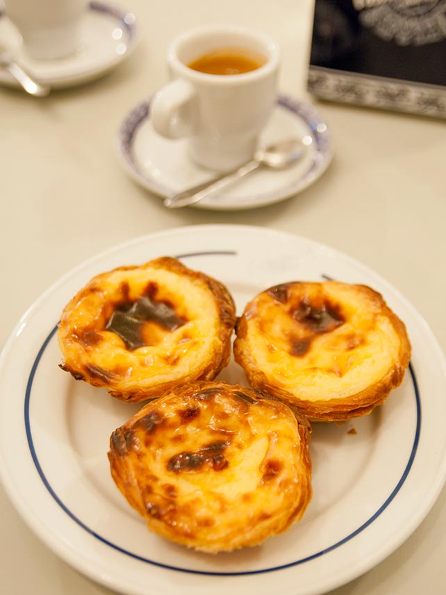 Pastel de nata (or Belem), a Portuguese sweet treat of flaky pastry filled with a creamy egg custard © Ayhan Altun / Getty Images