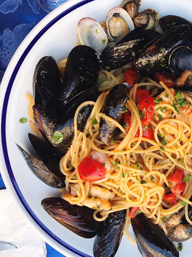 Try a tempting dish of spaghetti frutti di mare in Venice. © Tina Cush / EyeEm.