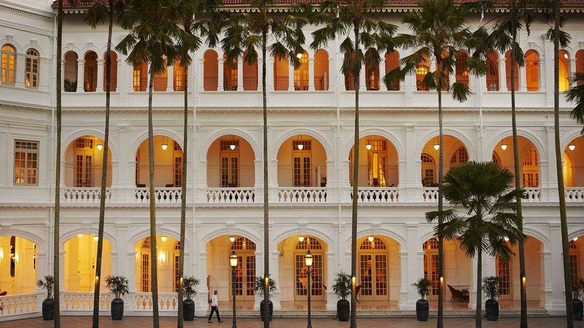 Palm Court in the evening at the Raffles Hotel,Singapore. ©Raffles Hotels & Resorts.